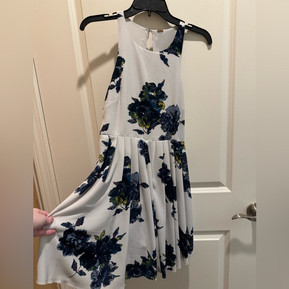 White A line dress with big blue flowers